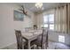 Cozy dining room featuring a four-chair table and seaside-themed decorations on the wall at 3178 Sea Grape Dr, Hernando Beach, FL 34607