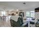 Open-concept living and kitchen area, perfect for entertaining, with ample natural light and modern appliances at 3178 Sea Grape Dr, Hernando Beach, FL 34607