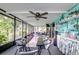 Bright sunroom with lots of light, an outdoor seating area, a bar, and views of the outdoors at 3178 Sea Grape Dr, Hernando Beach, FL 34607