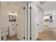 Clean bathroom with white vanity and updated fixtures at 4321 Tahitian Gardens Cir # A, Holiday, FL 34691