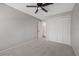 Bright bedroom with ceiling fan and neutral decor at 4321 Tahitian Gardens Cir # A, Holiday, FL 34691