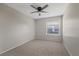 Spacious bedroom with neutral walls and carpet flooring at 4321 Tahitian Gardens Cir # A, Holiday, FL 34691