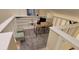 Upstairs landing with built-in bookshelves and cozy office space with seating area at 3605 Kings Rd # 102, Palm Harbor, FL 34685