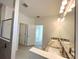 Bathroom with double vanity and large shower at 13447 Newport Shores Dr, Hudson, FL 34669