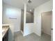 Bathroom with shower, toilet and vanity at 13447 Newport Shores Dr, Hudson, FL 34669