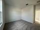 Spacious bedroom featuring grey carpet and neutral walls at 13447 Newport Shores Dr, Hudson, FL 34669