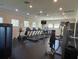 Fitness center featuring treadmills and weight machines at 13447 Newport Shores Dr, Hudson, FL 34669