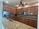 Community kitchen with granite countertops and modern appliances at 13447 Newport Shores Dr, Hudson, FL 34669