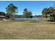 Scenic view of a lake in community at 13447 Newport Shores Dr, Hudson, FL 34669