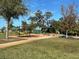 Community playground area with play equipment at 13447 Newport Shores Dr, Hudson, FL 34669