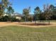 playground with swings and play structures at 13447 Newport Shores Dr, Hudson, FL 34669