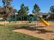 Playground with climbing structures and slide at 13447 Newport Shores Dr, Hudson, FL 34669