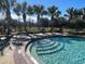 Relaxing pool area with lounge chairs at 13447 Newport Shores Dr, Hudson, FL 34669