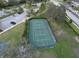 Overhead view of a community tennis court at 13447 Newport Shores Dr, Hudson, FL 34669