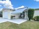 House exterior with carport and awning, welcoming entryway at 1542 Derrick St, Holiday, FL 34690