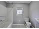 Simple bathroom with shower/tub combo and vanity at 3912 W San Pedro St, Tampa, FL 33629