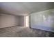 Spacious bedroom with grey carpet, and access to a bathroom at 3912 W San Pedro St, Tampa, FL 33629