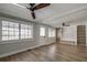 Hardwood floors and built-in shelves highlight this living room at 3912 W San Pedro St, Tampa, FL 33629