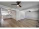 Bright living room with hardwood floors and built-in shelving at 3912 W San Pedro St, Tampa, FL 33629