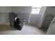 Unfinished bathroom under renovation with new drywall at 5521 Bay Blvd # 101, Port Richey, FL 34668