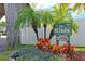 The Wilds community entrance, featuring a sign and lush landscaping at 6704 Hickorywood Ln # 2B, New Port Richey, FL 34653