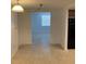 Dining area with view into living room and tile floor at 7240 Nova Scotia Dr, Port Richey, FL 34668