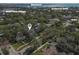 Aerial view showcasing home's location in a tree-lined neighborhood at 804 S Fremont Ave, Tampa, FL 33606