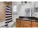 Bathroom with blue and white shower curtain and granite vanity at 804 S Fremont Ave, Tampa, FL 33606