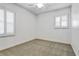 Simple bedroom with neutral walls and carpeted floors at 804 S Fremont Ave, Tampa, FL 33606