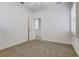 Bright bedroom with neutral walls and access to another room at 804 S Fremont Ave, Tampa, FL 33606