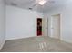 Bright bedroom with ceiling fan and neutral carpeting at 804 S Fremont Ave, Tampa, FL 33606