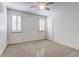 Spacious bedroom with ceiling fan and neutral carpeting at 804 S Fremont Ave, Tampa, FL 33606