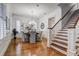 Elegant dining room with hardwood floors, chandelier, and views to kitchen at 804 S Fremont Ave, Tampa, FL 33606