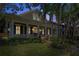 Charming two-story home with a front porch at dusk at 804 S Fremont Ave, Tampa, FL 33606