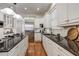 Spacious kitchen with granite countertops and white cabinets at 804 S Fremont Ave, Tampa, FL 33606