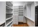 Large walk-in closet with ample shelving and hanging space at 804 S Fremont Ave, Tampa, FL 33606