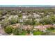 Aerial view of neighborhood with homes and trees at 6206 Soaring Ave, Temple Terrace, FL 33617