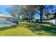 Large backyard with mature trees and pool at 6206 Soaring Ave, Temple Terrace, FL 33617