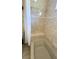 Clean bathroom with built-in shower seat at 6206 Soaring Ave, Temple Terrace, FL 33617