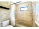 Updated bathroom with built-in shower seat at 6206 Soaring Ave, Temple Terrace, FL 33617