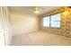 Bedroom with floral wallpaper and ceiling fan at 6206 Soaring Ave, Temple Terrace, FL 33617