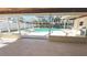 Inviting pool and spa with screened patio and grilling area at 6206 Soaring Ave, Temple Terrace, FL 33617