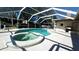 Enjoy this large pool and spa with a spacious screened patio at 6206 Soaring Ave, Temple Terrace, FL 33617