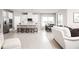 Open concept kitchen with stainless steel appliances and island at 10005 Zennia Ln, Parrish, FL 34219