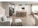 Modern kitchen with stainless steel appliances and an island at 10005 Zennia Ln, Parrish, FL 34219