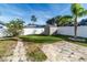 Large backyard with stone patio and shed at 12528 Roseland Dr, New Port Richey, FL 34654