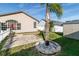 Backyard patio, palm tree, and storage shed at 12528 Roseland Dr, New Port Richey, FL 34654