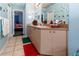 Double sink bathroom vanity with additional storage at 12528 Roseland Dr, New Port Richey, FL 34654