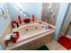 Relaxing bathroom with garden tub, shower, and updated fixtures at 12528 Roseland Dr, New Port Richey, FL 34654