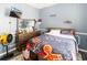 Bedroom with dresser and large bed, lots of natural light at 12528 Roseland Dr, New Port Richey, FL 34654